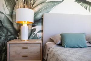 Posteľ alebo postele v izbe v ubytovaní Atico Buen Vivir en Marina Real II by Family Homes