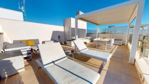 Posedenie v ubytovaní Atico Buen Vivir en Marina Real II by Family Homes
