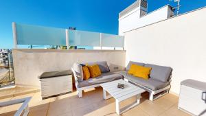 Posedenie v ubytovaní Atico Buen Vivir en Marina Real II by Family Homes