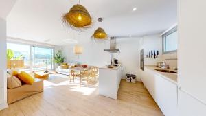 Posedenie v ubytovaní Atico Buen Vivir en Marina Real II by Family Homes