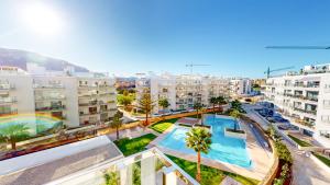 Bazén v ubytovaní Atico Buen Vivir en Marina Real II by Family Homes alebo v jeho blízkosti