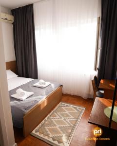 Postel nebo postele na pokoji v ubytování Pri Rooms