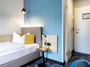 Postel nebo postele na pokoji v ubytování Hotel Purucker