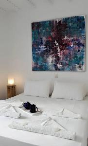 Ένα ή περισσότερα κρεβάτια σε δωμάτιο στο Mykonos Chora Apartment Near the Iconic Windmills