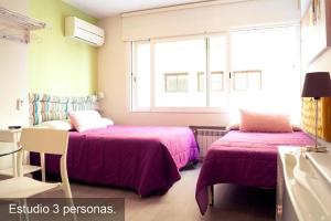 Postel nebo postele na pokoji v ubytování Chueca - Room Apartments