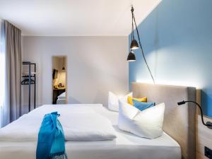 Postel nebo postele na pokoji v ubytování Hotel Purucker