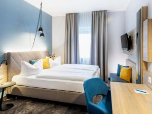 Postel nebo postele na pokoji v ubytování Hotel Purucker