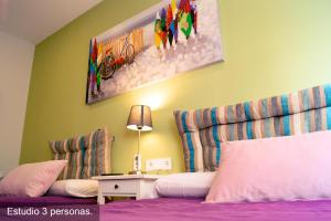 Postel nebo postele na pokoji v ubytování Chueca - Room Apartments