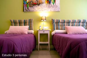 Postel nebo postele na pokoji v ubytování Chueca - Room Apartments