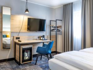 Postel nebo postele na pokoji v ubytování Hotel Purucker