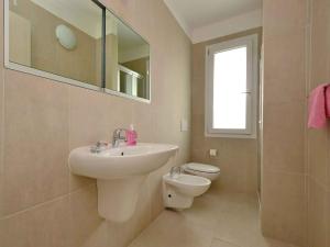 Ένα μπάνιο στο Apartments in Lignano 21589