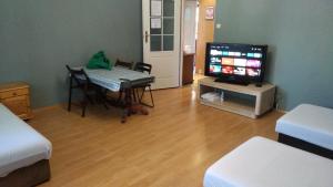TV a/nebo společenská místnost v ubytování FEIDUM quarters rooms