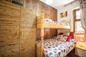 Postel nebo postele na pokoji v ubytování Casa Romantica - Camigliatello centro