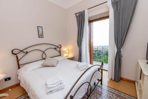 Posteľ alebo postele v izbe v ubytovaní Villa Tecla + 37 fotografií