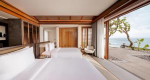 Regent Bali Canggu客房内的一张或多张床位