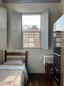 Ένα ή περισσότερα κρεβάτια σε δωμάτιο στο Casa 89