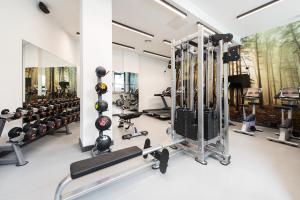 a gym with several treadmills and weights at Yugo Explore New Mill in Dublin