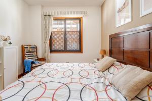 Ένα ή περισσότερα κρεβάτια σε δωμάτιο στο La Marina Suite