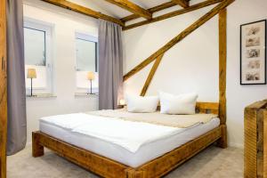 Giường trong phòng chung tại Ferienwohnung Oberdeck Eckernförde