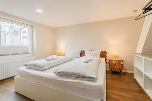 Postel nebo postele na pokoji v ubytování Hotel Seepferdchen Zimmer 1 Eckernförde Self-Check-In