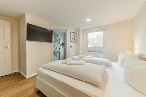 Postel nebo postele na pokoji v ubytování Hotel Seepferdchen Zimmer 1 Eckernförde Self-Check-In