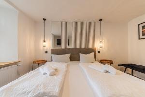 Postel nebo postele na pokoji v ubytování Hotel Seepferdchen Zimmer 3 Eckernförde Self-Check-In + 13 fotografií