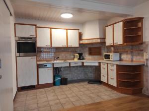 Kuchyň nebo kuchyňský kout v ubytování Putz Appartements
