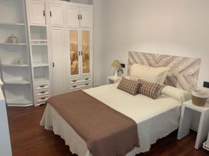 Posteľ alebo postele v izbe v ubytovaní Casa Castillo Finisterre