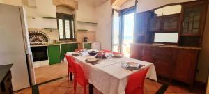 Kuchyň nebo kuchyňský kout v ubytování Il cortile sul mare