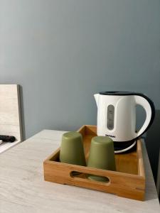 a coffee maker and a toaster on a table at Blue Tide - Tropea in Tropea
