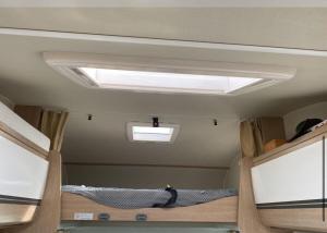 a ceiling with a skylight in a room at Camper Van 2018 Fiat capron A72 model in Reykjavík