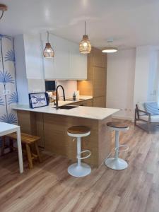 Kuchyň nebo kuchyňský kout v ubytování Duplex Albatros Mar de Cristal + 11 fotografií