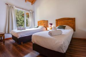 Postel nebo postele na pokoji v ubytování Bog Apart Foresta, Moderno Apartamento en la Naturaleza