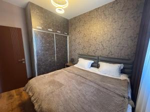 Postel nebo postele na pokoji v ubytování PoolSummerHouse
