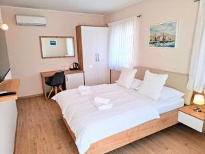 Postel nebo postele na pokoji v ubytování Guest House Ankora