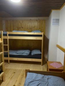 a bunk bed room with two bunk beds in it at Koča na Kranjski dolini Krnica 93 a,Pokljuka in Zgornje Gorje +37 photos