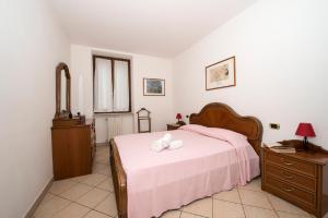 Postel nebo postele na pokoji v ubytování Cà Bottrigo + 28 fotografií