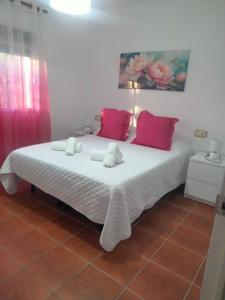 Katil atau katil-katil dalam bilik di Apartamento Las adelfas