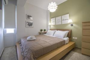 Voodi või voodid majutusasutuse Bianca Suites toas