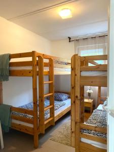 Ένα ή περισσότερα κρεβάτια σε δωμάτιο στο Alida apartman Tokaj Tisza part