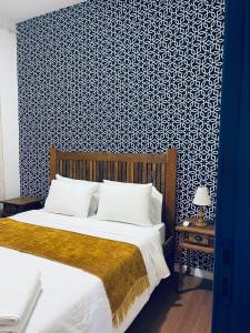 Postel nebo postele na pokoji v ubytování Casas da Villa - CASA DE TEMPORADA + 8 fotografií