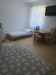 Postel nebo postele na pokoji v ubytování Donata