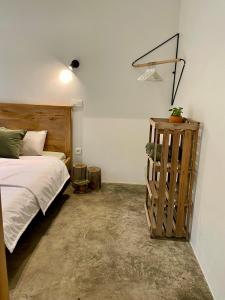 Postel nebo postele na pokoji v ubytování Rwengaju guest home
