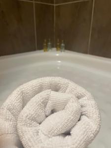 a large white rope sitting on top of a bath tub at ENV Langosteira in Fisterra +18 photos