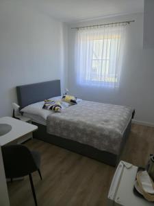 Postel nebo postele na pokoji v ubytování Donata