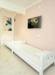 Apartmani Una Igalo客房内的一张或多张床位