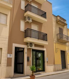 a building with balconies on the side of it at SOGNO D'ESTATE 2 in Mazara del Vallo