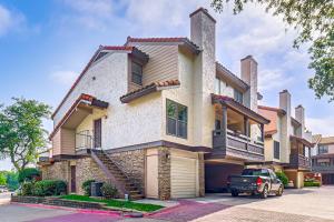 a house with a car parked in front of it at WFH-Friendly Condo Near Galleria in North Dallas! in Dallas