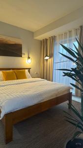 Postel nebo postele na pokoji v ubytování Hotel Lucy Star