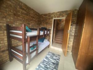 A bed or beds in a room at Check Point